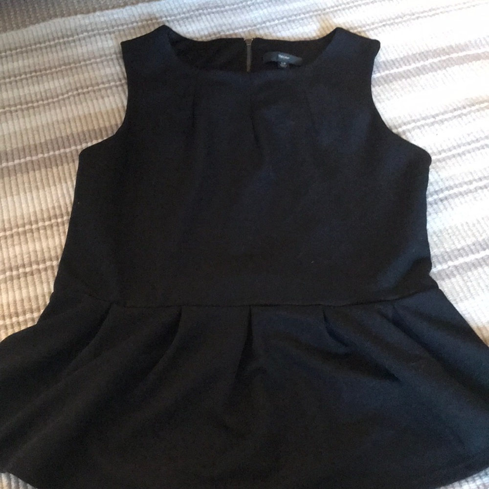 Formal blouse top with quarter back zipper.